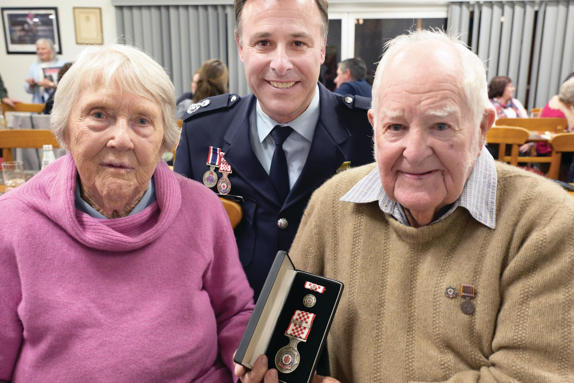Alice Harrison and Bryan Suckling with 80-year medal recipient Cliff Harrison. LH PHOTOS