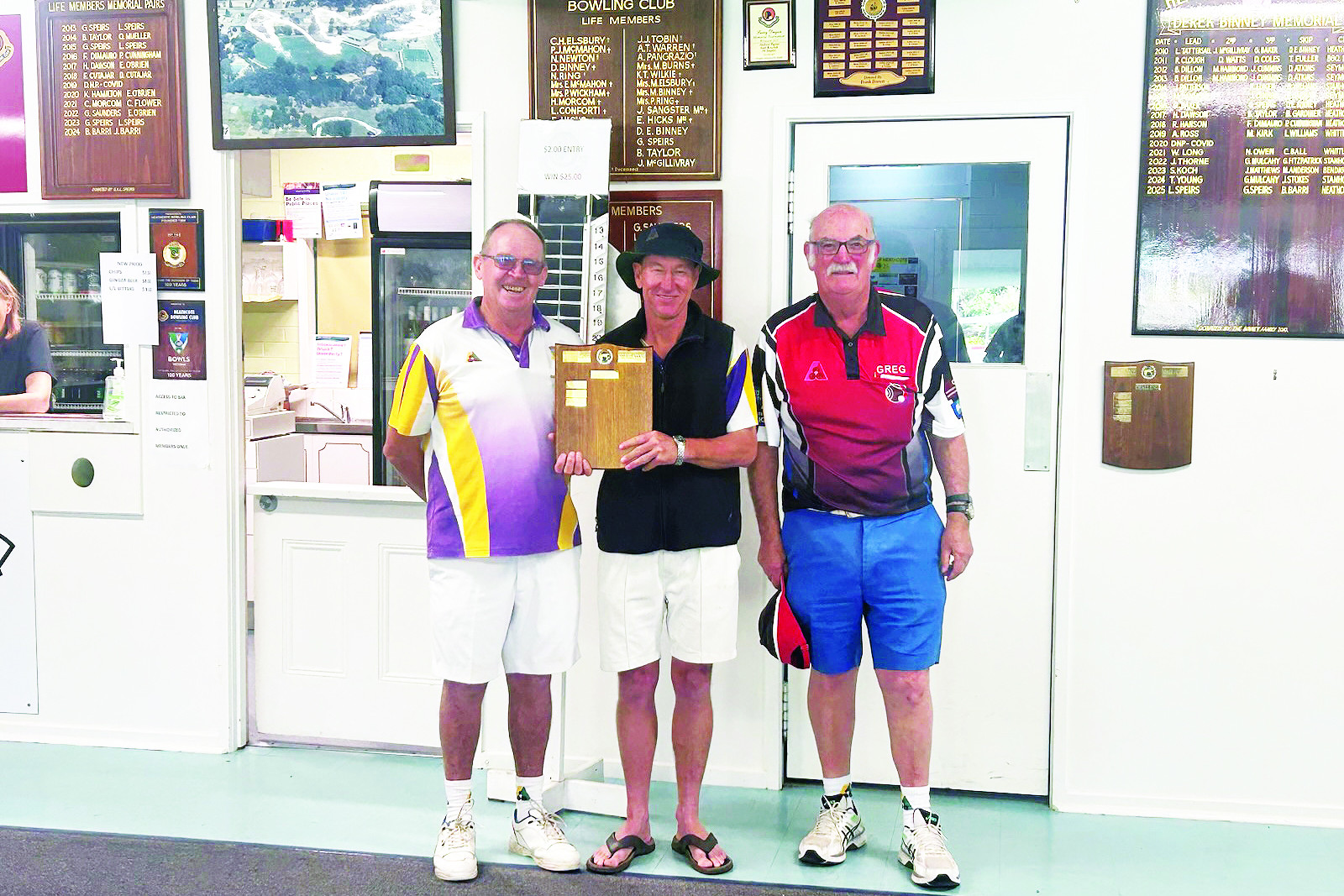 Serpentine president Brian Gladman and the side’s manager Ben Long reclaim the trophy from Heathcote president Greg Spiers