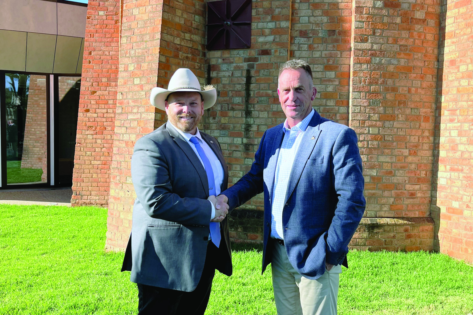 Baton change ... Dan Straub and Stuart King