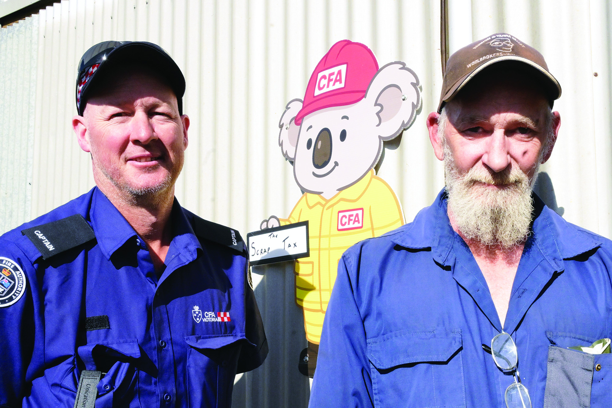Still campaigning against new tax ... Rheola brigade captain John Leach and Peter Leach. LH PHOTO