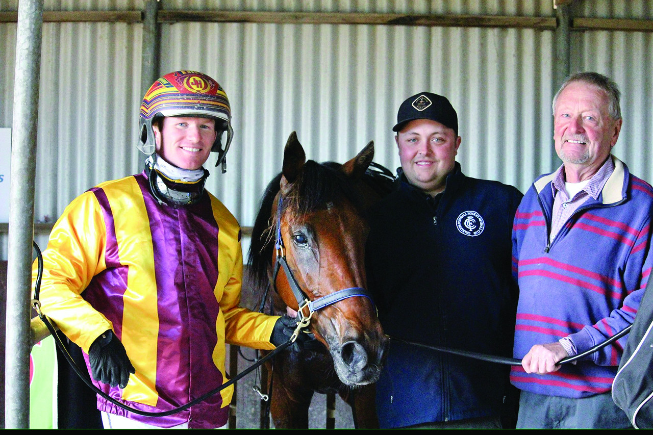 Stawell winner Me And Zac with driver James Herbertson, trainer Zac Steenhuis and owner Gavan Holt.